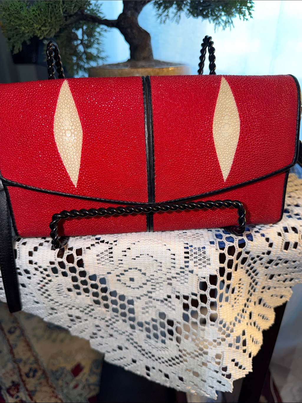 Red Stingray-Texture Crossbody Bag With Black Trim And Cream Accents